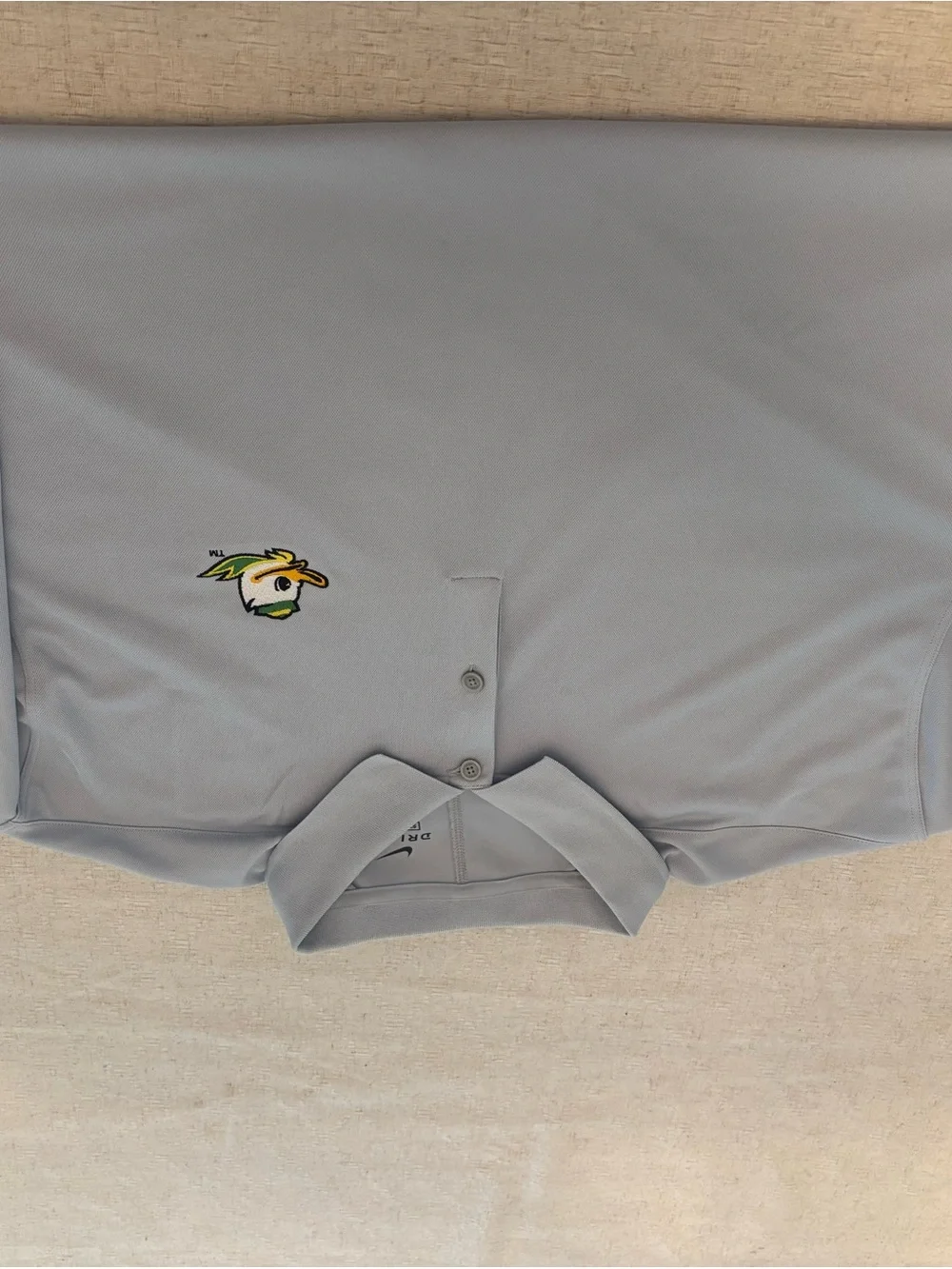 Nike fabric polo features